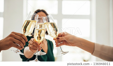 Three hands toast with champagne, toast brings joy, toast marks success 136948011