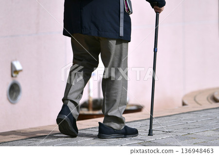 Yokohama cityscape in Japan. Steps... Elderly man with a cane... Dangerous sidewalk... What is life... 136948463