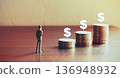 Miniature people looking future with stack coin about financial and money savings concept. 136948932