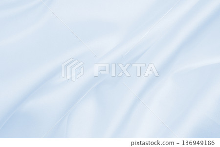 Smooth elegant blue silk or satin luxury cloth texture as abstract background. Luxurious background design Smooth elegant blue silk or satin luxury cloth texture as abstract background. Luxurious background design 136949186