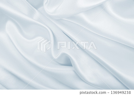 Smooth elegant grey silk or satin luxury cloth as wedding background. Luxurious Christmas background or New Year background design Smooth elegant grey silk or satin luxury cloth as wedding background. Luxurious Christmas background or New Year background design 136949238