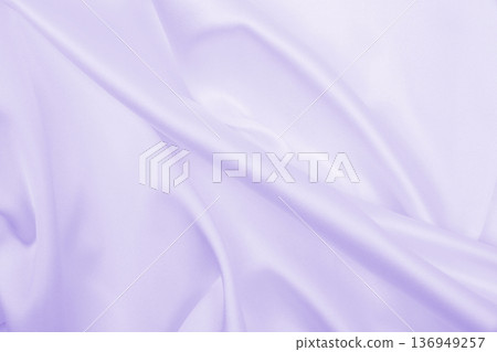 Smooth elegant lilac silk or satin texture as wedding background. Luxurious background design Smooth elegant lilac silk or satin texture as wedding background. Luxurious background design 136949257