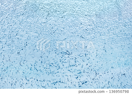 Broken glass close up background Broken glass close up background 136950798