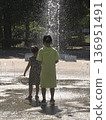 Children playing with fountains 136951491