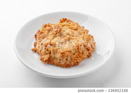 One freshly baked peanut cookie. One freshly baked peanut cookie. 136952188