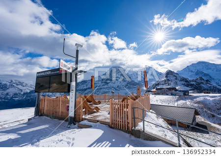 Wooden observation deck of the Männlichen Royal Walk with spectacular views of the Eiger. Wengen, canton of Bern, Switzerland Wooden observation deck of the Männlichen Royal Walk with spectacular views of the Eiger. Wengen, canton of Bern, Switzerland 136952334