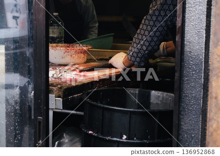 Filleting eels Filleting eels 136952868