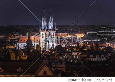 Night cityscape of Prague with illuminated Church of Our Lady before Tyn and historic rooftops in Old Town Czech Republic 136954761