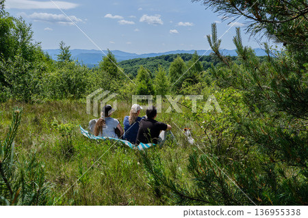 Family Picnic with Dog on Mountain View 136955338