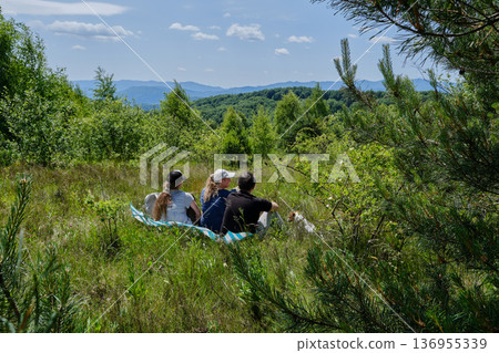 Family Picnic with Dog on Mountain View 136955339