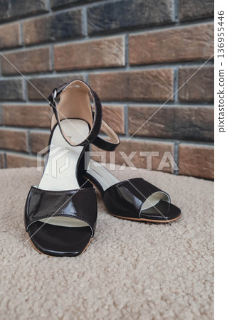 Elegant patent leather sandals high heels blank product for branding displayed. New casual female sandals no-brand footwear e-commerce. No logo product unbranded fashion footwear 136955446