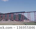 A breathtaking composition looking up at the Amarube Viaduct, featuring a DD51 locomotive and old-style passenger cars, capturing the railway scenery of the San'in Main Line in the Showa era. 136955846