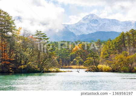 Autumn in Urabandai, Fukushima: Lake Goshikinuma with autumn foliage, Lake Bishamon and Mount Bandai Autumn in Urabandai, Fukushima: Lake Goshikinuma with autumn foliage, Lake Bishamon and Mount Bandai 136956197