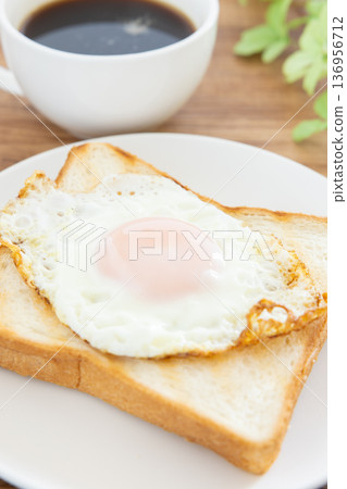 A delicious morning of fried egg toast and coffee 136956712
