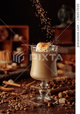 Cream and coffee cocktail with toasted marshmallow and chocolate crumbs. 136957030