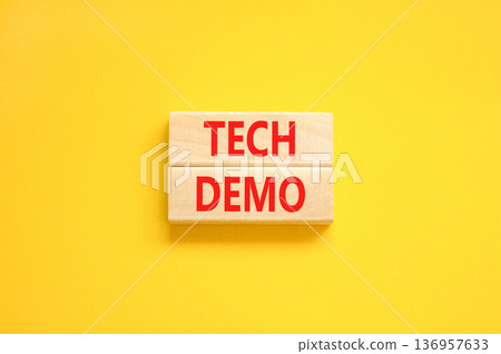 Tech demo symbol. Concept word Tech demo on beautiful wooden blocks. Beautiful yellow paper background. Business tech demo concept. Copy space. Tech demo symbol. Concept word Tech demo on beautiful wooden blocks. Beautiful yellow paper background. Business tech demo concept. Copy space. 136957633