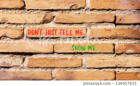 Tell or show symbol. Concept words Do not just tell me, show me on beautiful brick wall. Beautiful brick wall background. Business tell or show concept. Copy space. Tell or show symbol. Concept words Do not just tell me, show me on beautiful brick wall. Beautiful brick wall background. Business tell or show concept. Copy space. 136957655
