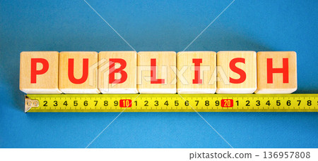 Publish word symbol. Concept word Publish on beautiful wooden blocks. Beautiful blue background. Beautiful yellow ruler. Business publish word concept. Copy space. Publish word symbol. Concept word Publish on beautiful wooden blocks. Beautiful blue background. Beautiful yellow ruler. Business publish word concept. Copy space. 136957808