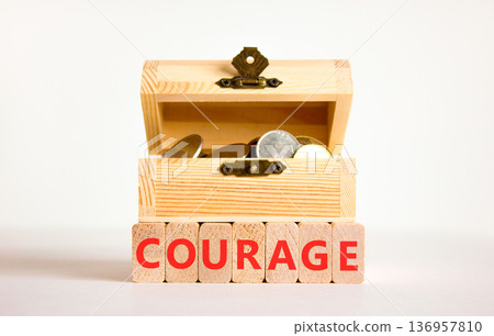 Courage symbol. Concept word Courage on beautiful wooden blocks. Beautiful white background. Beautiful wooden chest with coins. Business courage concept. Copy space. Courage symbol. Concept word Courage on beautiful wooden blocks. Beautiful white background. Beautiful wooden chest with coins. Business courage concept. Copy space. 136957810