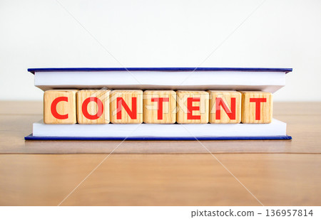 Content symbol. Concept word Content on beautiful wooden blocks in book. Beautiful wooden table white background. Business content concept. Copy space. Content symbol. Concept word Content on beautiful wooden blocks in book. Beautiful wooden table white background. Business content concept. Copy space. 136957814