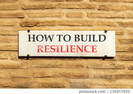 How to build resilience symbol. Concept words How to build resilience on beautiful white marble sign plate. Beautiful brick wall background. Business how to build resilience concept. Copy space. How to build resilience symbol. Concept words How to build resilience on beautiful white marble sign plate. Beautiful brick wall background. Business how to build resilience concept. Copy space. 136957950