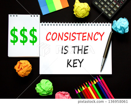 Consistency is the key symbol. Concept words Consistency is the key on beautiful white note. Beautiful black background. Black pen. Business consistency is the key concept. Copy space. Consistency is the key symbol. Concept words Consistency is the key on beautiful white note. Beautiful black background. Black pen. Business consistency is the key concept. Copy space. 136958061
