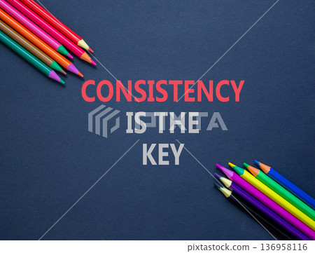 Consistency is the key symbol. Concept words Consistency is the key on beautiful grey paper. Beautiful grey background. Colored pencils. Business consistency is the key concept. Copy space. 136958116