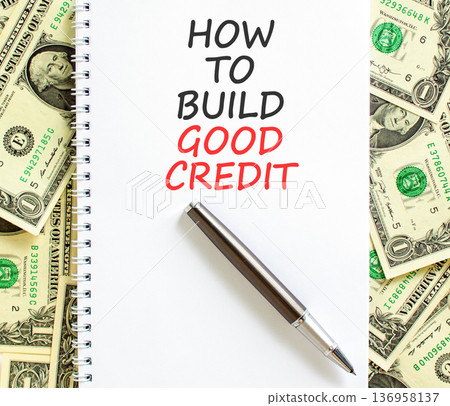How to build good credit symbol. Concept words How to build good credit on beautiful white note. Beautiful dollar bills background. Dollar bills. Business how to build good credit concept. Copy space. 136958137