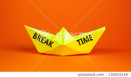 Break time symbol. Concept word Break time on beautiful yellow paper boat. Beautiful orange paper background. Business break time concept. Copy space. Break time symbol. Concept word Break time on beautiful yellow paper boat. Beautiful orange paper background. Business break time concept. Copy space. 136958144