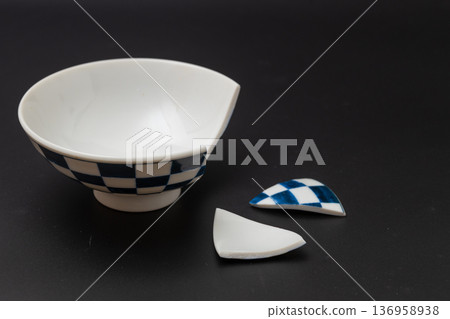 Broken rice bowl, Japanese tableware with a checkered pattern and a black background 136958938