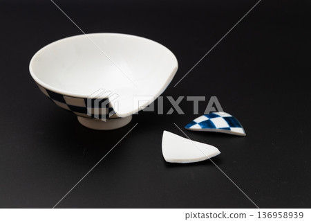 Broken rice bowl, Japanese tableware with a checkered pattern and a black background 136958939