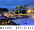 A lighted up bathhouse 136959111
