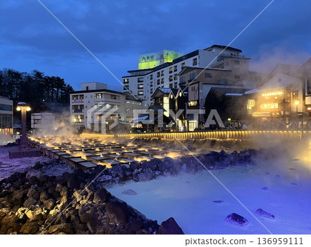 A lighted up bathhouse 136959111