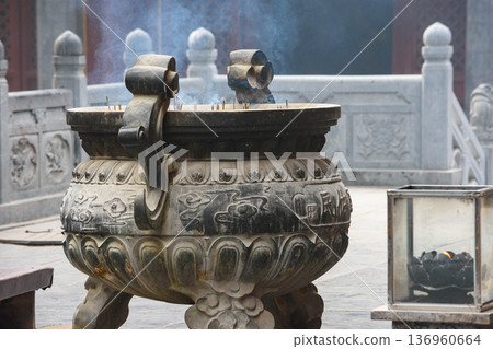 Incense burner at the martial arts Buddhist Shaolin Monastery in Luoyang, China Incense burner at the martial arts Buddhist Shaolin Monastery in Luoyang, China 136960664
