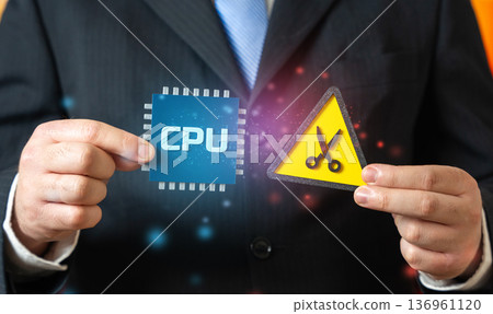 CPU chip and scissors. A reduction in the number of chips produced. Supply disruptions and price volatility. Semiconductor shortage and global supply chain crisis concept. CPU chip and scissors. A reduction in the number of chips produced. Supply disruptions and price volatility. Semiconductor shortage and global supply chain crisis concept. 136961120
