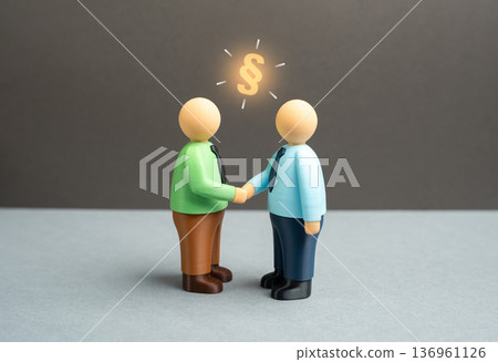 Two businessmen signed a handshake agreement. Conclude a contract. Partnership deal and mutual trust. Successful negotiation and corporate cooperation concept. Two businessmen signed a handshake agreement. Conclude a contract. Partnership deal and mutual trust. Successful negotiation and corporate cooperation concept. 136961126