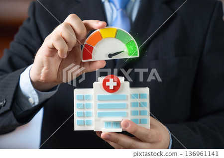 A hospital and its performance scale show the highest efficiency score. Good medical performance figures and quality care standards. Healthcare excellence and patient satisfaction 136961141