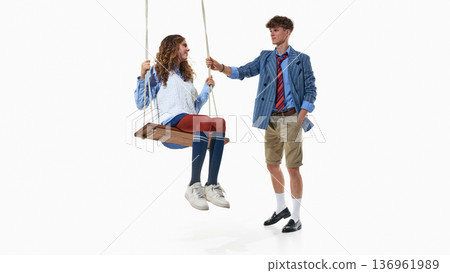 Youth preppy fashion look with swing interaction isolated on white. Youth preppy fashion look with swing interaction isolated on white. 136961989
