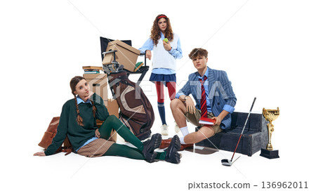 Teenage students in preppy school outfits with golf bag books and trophy isolated on white. 136962011