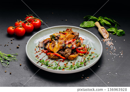 Roasted beef with vegetables and potatoes served on gourmet restaurant plate Roasted beef with vegetables and potatoes served on gourmet restaurant plate 136963928