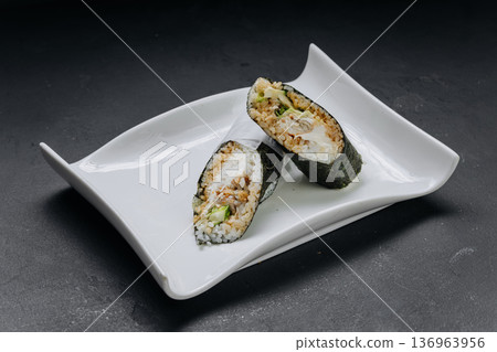 Temaki sushi hand roll with chicken rice and cream cheese served on white plate Temaki sushi hand roll with chicken rice and cream cheese served on white plate 136963956