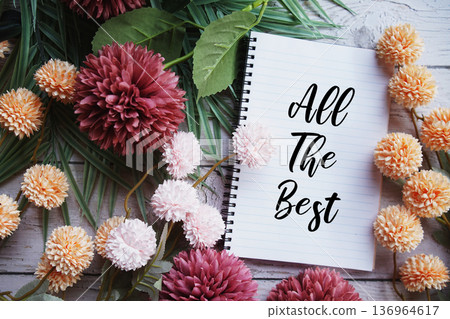 All The Best text message with flowers decoration on wooden background All The Best text message with flowers decoration on wooden background 136964617