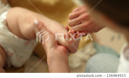 Infant Baby Foot Massage. Parenting, Wellness, Early Childhood. Nurturing Touch Infant Baby Foot Massage. Parenting, Wellness, Early Childhood. Nurturing Touch 136964915