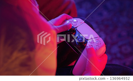 Gamer Kid Hands Playing Video Game On Console With Joystick.schoolboy Having Fun Gamer Kid Hands Playing Video Game On Console With Joystick.schoolboy Having Fun 136964932