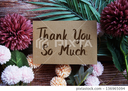 Thank You so much text with flowers bouquet decoration on wooen background Thank You so much text with flowers bouquet decoration on wooen background 136965094