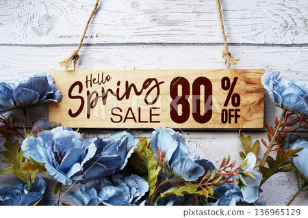 Spring Sale 80% off with flower bouquet decoration on wooden background 136965129
