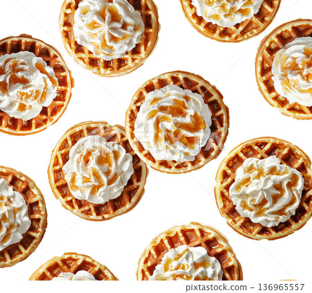 Golden waffles topped with whipped cream and caramel syrup, isolated on white background, concept of sweet breakfast Golden waffles topped with whipped cream and caramel syrup, isolated on white background, concept of sweet breakfast 136965557