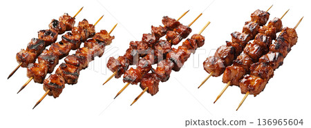Grilled chicken yakitori skewer with teriyaki glaze or Isaw Filipino street food isolated on white transparent background Grilled chicken yakitori skewer with teriyaki glaze or Isaw Filipino street food isolated on white transparent background 136965604