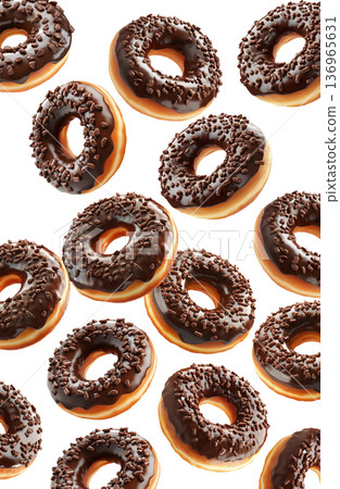 Multiple chocolate glazed donuts with chocolate sprinkles isolated on a white background, concept of sweet dessert snack Multiple chocolate glazed donuts with chocolate sprinkles isolated on a white background, concept of sweet dessert snack 136965631