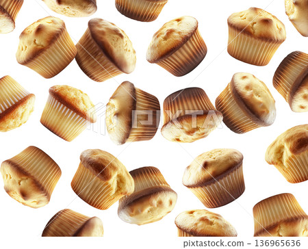 Freshly baked golden vanilla muffins scattered isolated on white background, concept of homemade bakery treats 136965636